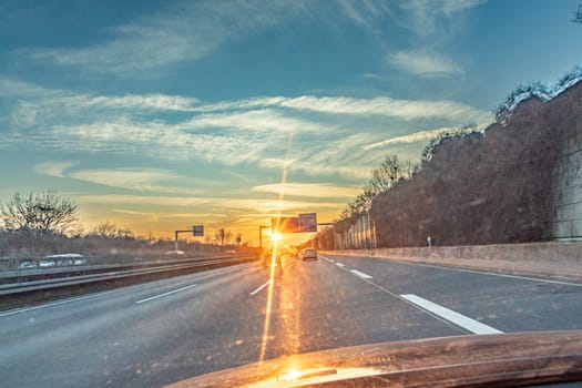 sunset at the highway with cars in Germany
