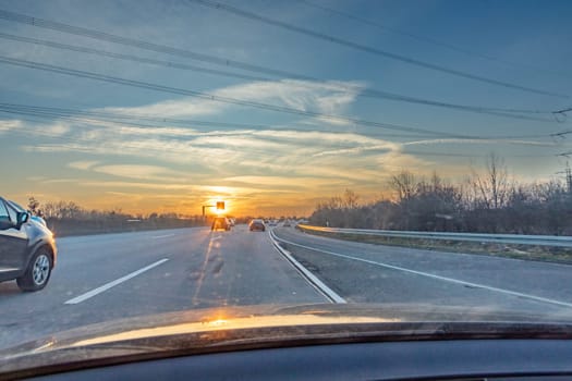 sunset at the highway with cars in Germany