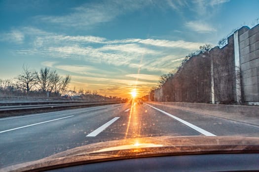 sunset at the highway with cars in Germany