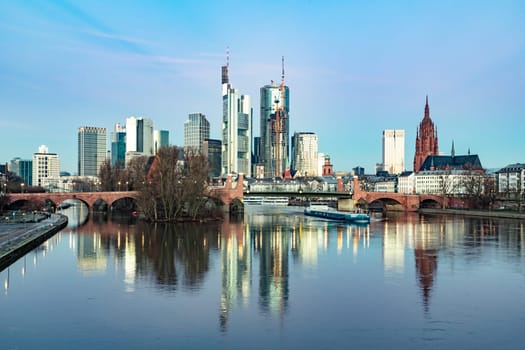 scenic skyline of Frankfurt am Main with reflection in the river, Hesse, Germany