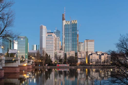 scenic skyline of Frankfurt am Main with reflection in the river, Hesse, Germany