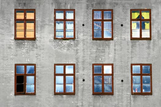 pattern of windows in geometric structure at an old house wall in Copenhagen, Denmark