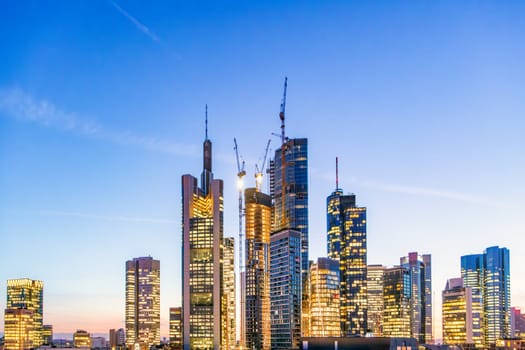 Frankfurt, Germany - February 2, 2024: scenic aerial view to skyline of Frankfurt with skyscraper in dawn