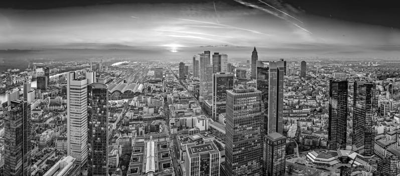 scenic aerial view to skyline of Frankfurt with skyscraper in dawn and spectacular sunset