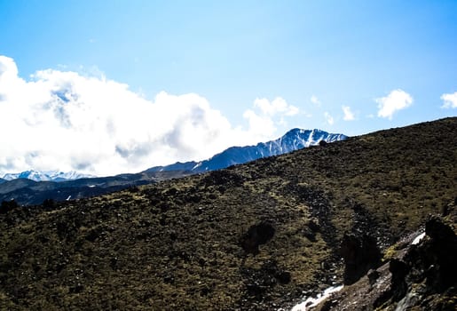 Mountain landscape with a stony scattering. Mountain landscape. Rocks without vegetation.