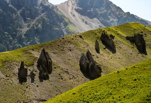 Mountain landscape with grass in the hills. Mountain landscape. Mountain vegetation.
