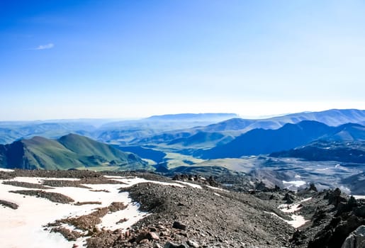 Mountain landscape with snow. Snow in the mountains. Mountain landscape.