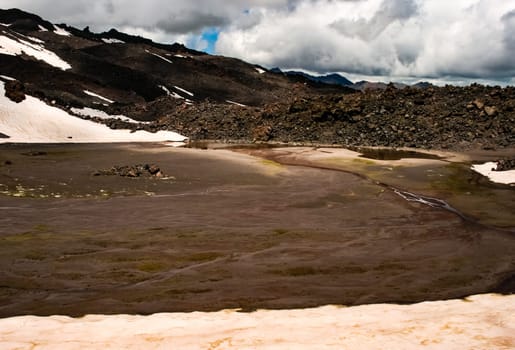 Mountain landscape with snow. Snow in the mountains. Mountain landscape.