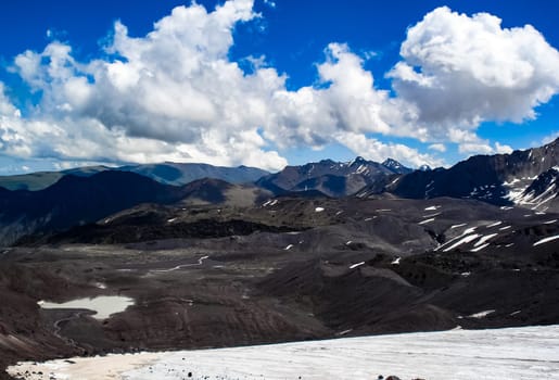 Mountain landscape with snow. Snow in the mountains. Mountain landscape.