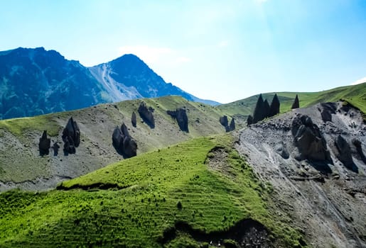 Mountain landscape with grass in the hills. Mountain landscape. Mountain vegetation.