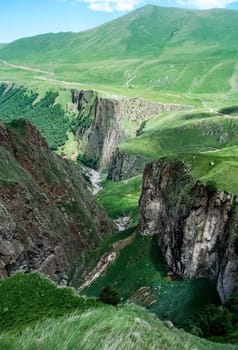 Mountain landscape with grass in the hills. Mountain landscape. Mountain vegetation.