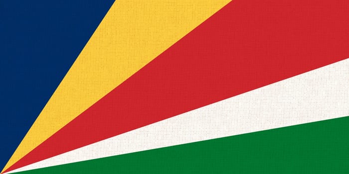 Flag of Seychelles islands. Seychelles flag on fabric surface. National symbol. Country in Indian ocean. Fabric texture. Republic of Seychelles. Island country. 3 D illustration