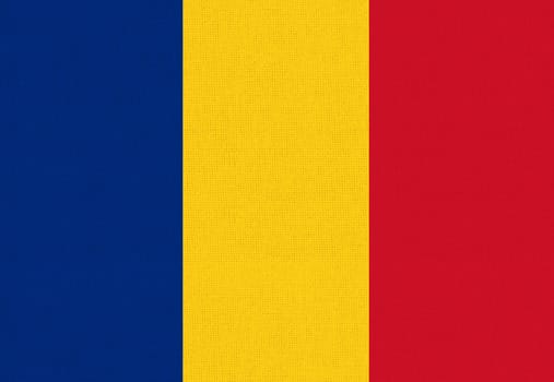 Flag of Romania. Romanian flag on fabric texture. National Romanian symbol. Romanian national flag. Fabric texture. European country. National symbol