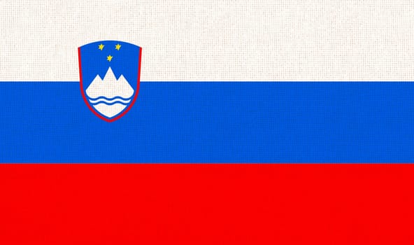 Flag of Slovenia. Slovenian flag on fabric texture. National Slovenian symbol. Slovenian national flag. European country. National symbol of Slovenia