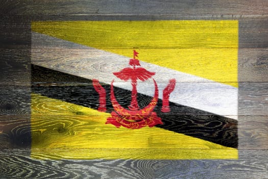 A Brunei flag on rustic old wood surface background