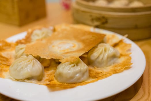 Pan fry with steamed pork meat bun