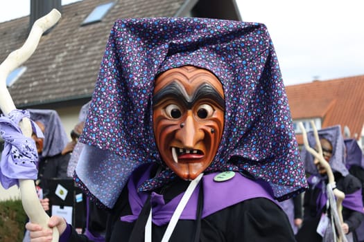 Theme picture - Carnival Carnival  The fools are on the loose at the Alemannic-Swabian Carnival. Like here in Hartheim on the Rhine,the jesters parade through the streets,here the Kirchhofen castle moat witches