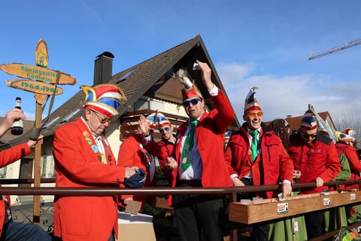 Theme picture - Carnival Carnival  The fools are on the loose at the Alemannic-Swabian Carnival. As here in Hartheim am Rhein,the jesters parade through the streets,here the parade float of the Hartheim Rhine spirits with the Narrenrat/Elferrat