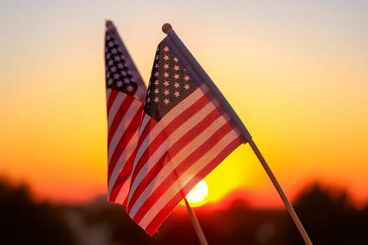 Close-up American flags against sunset sky. United States of America flags - back lighted. 4th july - Independence Day. AI generated