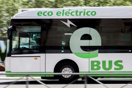 Valladolid, Spain: July 17th, 2020: Eco-Electric urban bus circulating along Valladolid streets. Eco driving concept