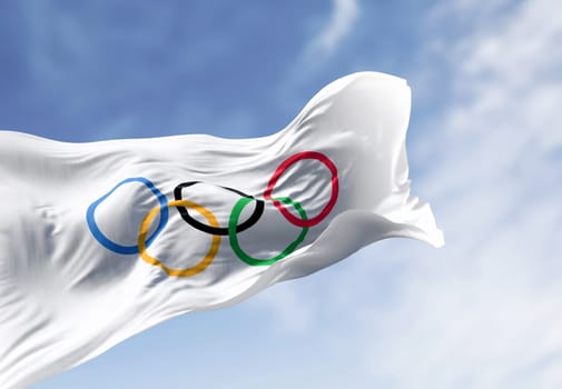 Paris, FR, Oct. 12 2023: Olympics Games flags waving in the wind on a clear day. International sporting event. Illustrative editorial 3d illustration render.