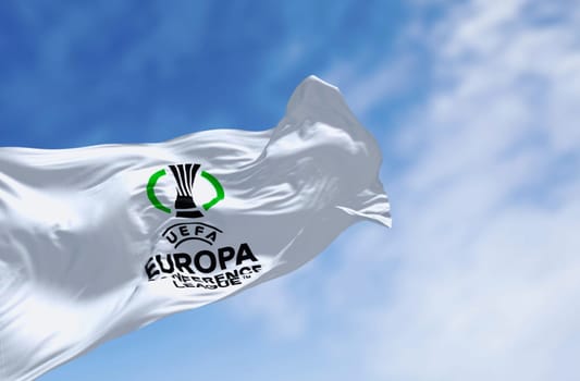 Athens, GR, Dec 20 2023: UEFA Europa Conference League flag waving on a clear day. Annual football club competition for european clubs. illustrative editorial 3D illustration render