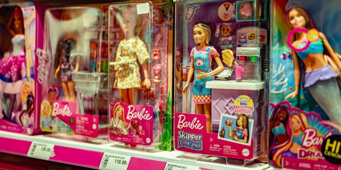 POZNAN, POL - JAN 12, 2024: Barbie dolls put up for sale on a store shelf