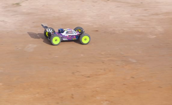 Merida, Spain - Jan 28th, 2024: Extremadura 1/8tt gas Championship RC Car. Car accelerating on a straight