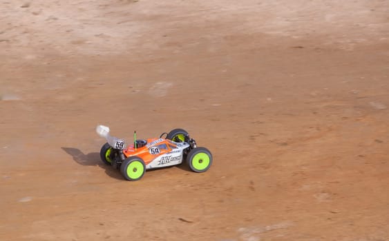 Merida, Spain - Jan 28th, 2024: Extremadura 1/8tt gas Championship RC Car. Car accelerating on a straight