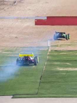 Merida, Spain - Jan 28th, 2024: Extremadura 1/8tt gas Championship RC Car. Cars crossing the finish line