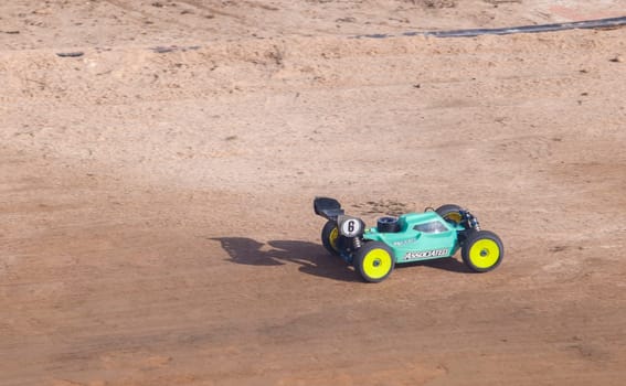 Merida, Spain - Jan 28th, 2024: Extremadura 1/8tt gas Championship RC Car. Car accelerating on a straight