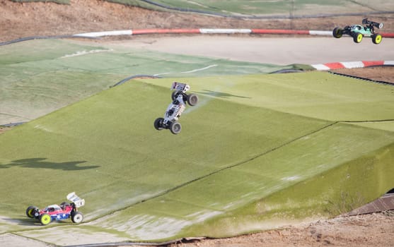 Merida, Spain - Jan 28th, 2024: Extremadura 1/8tt gas Championship RC Car. Cars jumping