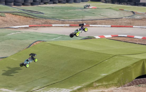 Merida, Spain - Jan 28th, 2024: Extremadura 1/8tt gas Championship RC Car. Cars jumping
