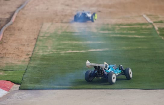Merida, Spain - Jan 28th, 2024: Extremadura 1/8tt gas Championship RC Car. Cars crossing the finish line