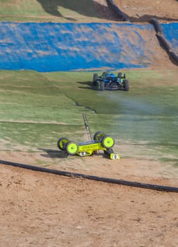 Merida, Spain - Jan 28th, 2024: Extremadura 1/8tt gas Championship RC Car. Overturned car