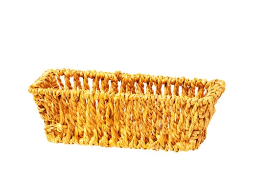 Empty wicker basket isolated on a white background. Clipping path. For your food and product display assembly. Macro of a straw basket.