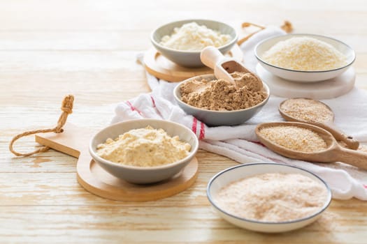 Assortment of various gluten free flour,  without carbohydrate (almond and coconut flour, psyllium husk powder, rough-ground flaxseed flour)