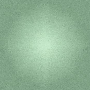The background texture is green with a macro geometric pattern