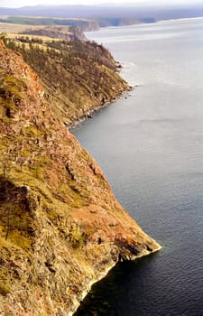 Spring on Baikal, ice and snow on the lake melt. The beauty of the nature of Baikal in the early spring.