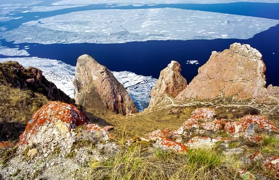 Spring on Baikal, ice and snow on the lake melt. The beauty of the nature of Baikal in the early spring.