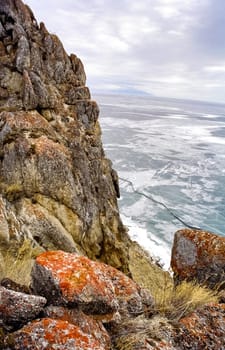 Winter on the Baikal, ice and snow on the lake. The beauty of the nature of Baikal in winter.