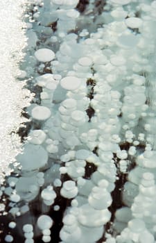 Winter on the Baikal, ice and snow on the lake. The beauty of the nature of Baikal in winter.