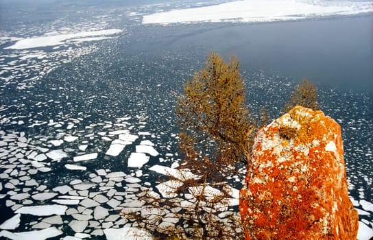 Winter on the Baikal, ice and snow on the lake. The beauty of the nature of Baikal in winter.