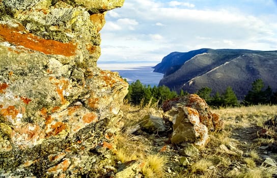 Winter on the Baikal, ice and snow on the lake. The beauty of the nature of Baikal in winter.