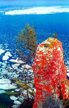 Winter on the Baikal, ice and snow on the lake. The beauty of the nature of Baikal in winter.