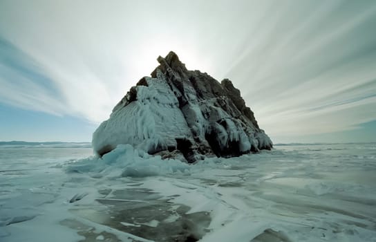Winter on the Baikal, ice and snow on the lake. The beauty of the nature of Baikal in winter.