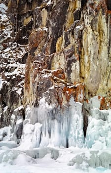 Winter on the Baikal, ice and snow on the lake. The beauty of the nature of Baikal in winter.