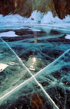 Winter on the Baikal, ice and snow on the lake. The beauty of the nature of Baikal in winter.