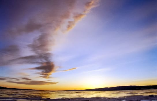 Winter on the Baikal, ice and snow on the lake. The beauty of the nature of Baikal in winter.