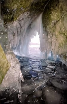 Winter on the Baikal, ice and snow on the lake. The beauty of the nature of Baikal in winter.